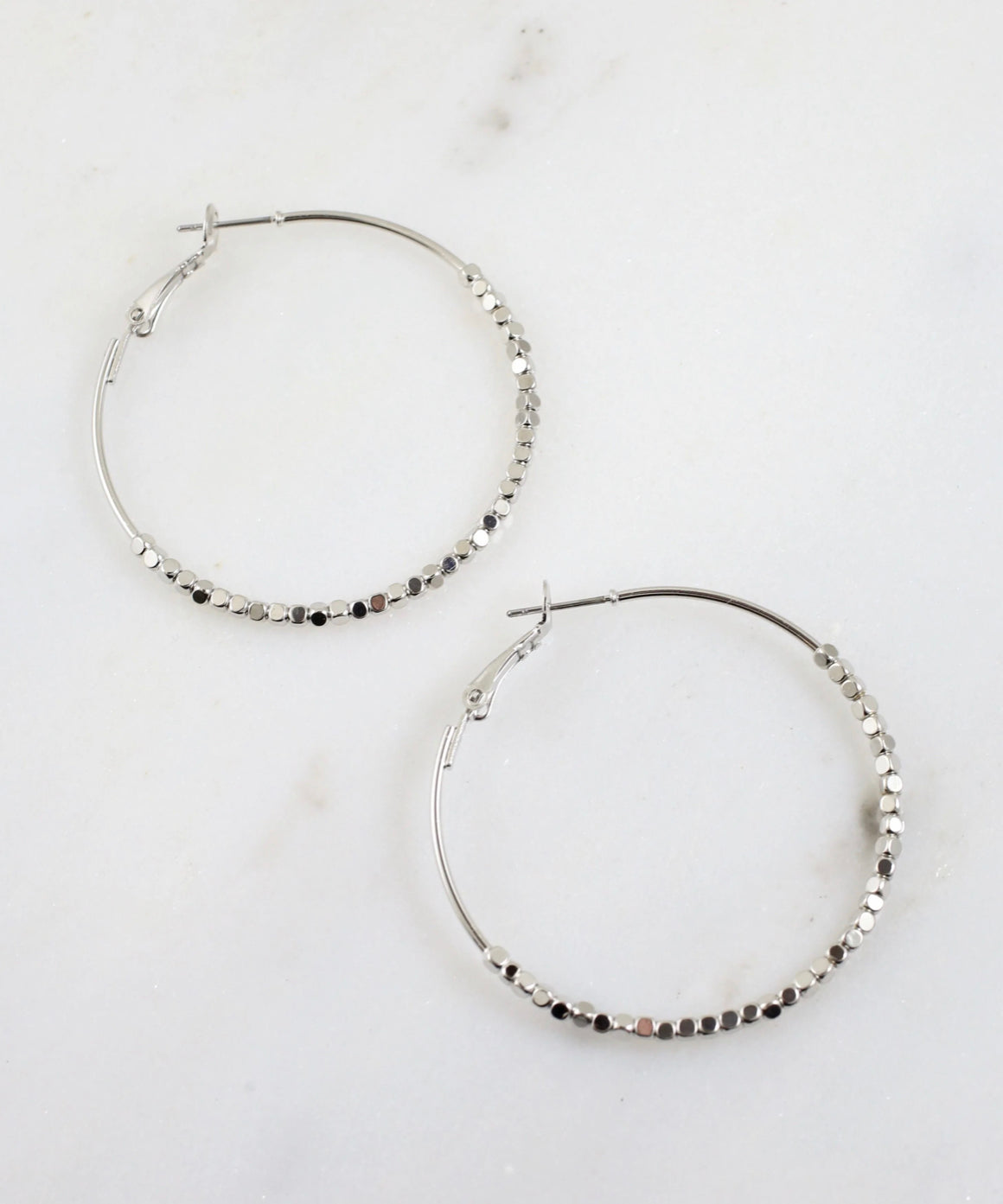 Shiny silver hoop earrings